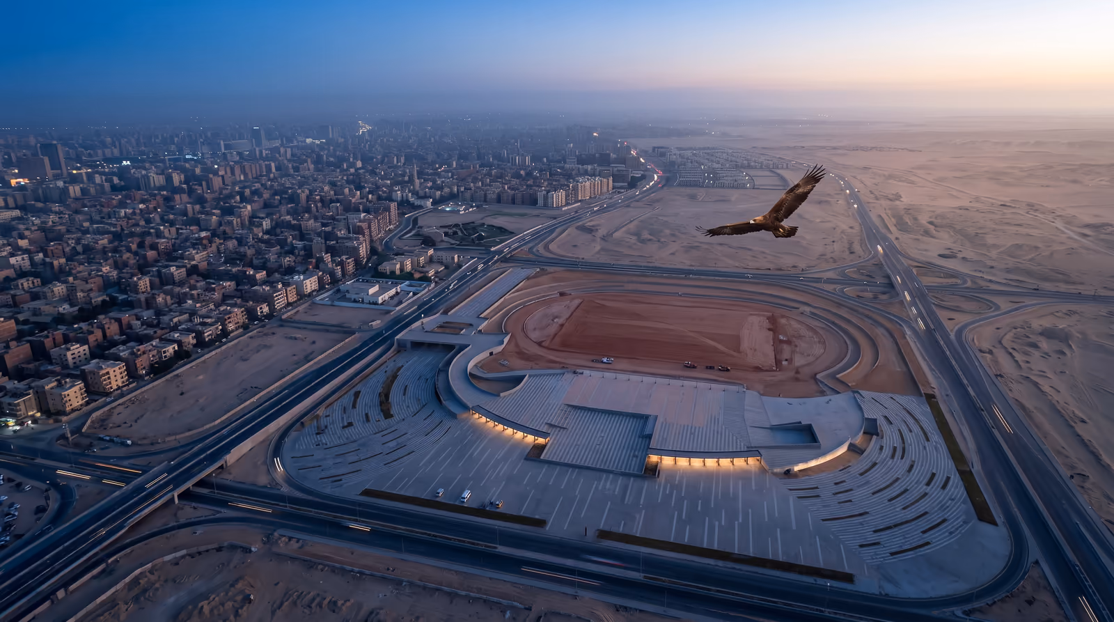 Dawn aerial view of the project site in Sheikh Zayed with Greater Cairo beyond